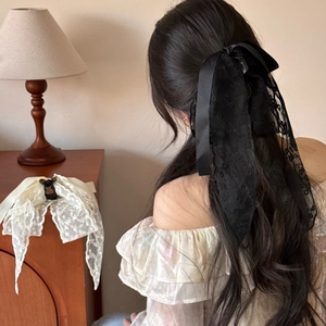 Elegant French lace bow hair clip with long ribbons for women, black and white style