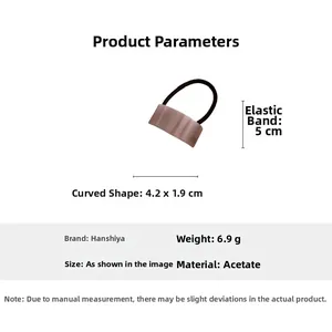 Detail view of acetate hair tie showing dimensions 4.2x1.9cm and high elastic band
