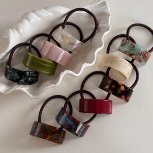 Elegant acetate geometric hair rings in ten assorted patterns on shell plate