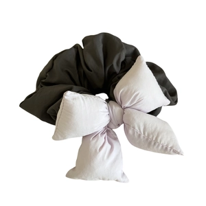 Chic dark gray oversized scrunchie featuring a pastel purple plush 3D bow hair tie