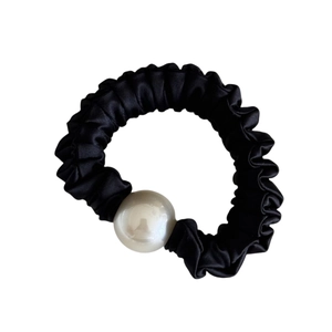 Elegant black satin hair scrunchie with large white pearl accent and elastic band