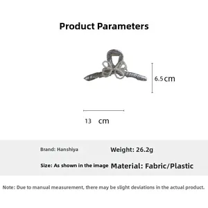 Specifiche dettagliate delle dimensioni della molletta grigia in tessuto di 13cm x 6,5cm