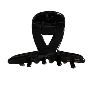 Pince à cheveux croisée en acétate noir brillant avec inscription dorée Barrette La France