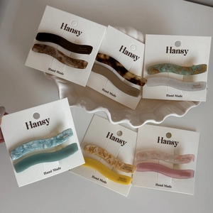 Lot de barrettes à cheveux ondulées en acétate aux motifs marbrés et couleurs douces