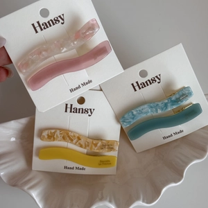 Lot de barrettes à cheveux ondulées en acétate avec motifs marbrés et tons translucides
