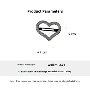 Vue détaillée de la pince à cheveux cœur pailletée montrant la taille de 6,3 cm