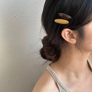Set of 2 macaron color oval acetate hair clips in brown tortoiseshell and cream yellow