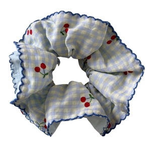 Blue gingham scrunchie with red cherry print and scalloped navy embroidered edges