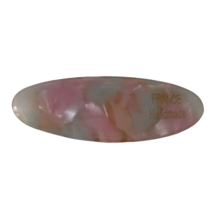 Pink and white marble acetate oval hair clip featuring France Handmade gold lettering