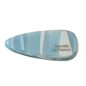 Barrette goutte d'eau avec texture marbre bleu clair et inscription Barrette La France