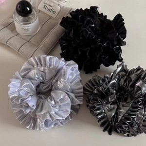 Three-piece large pleated scrunchie set in metallic silver, black, and grey glossy fabric