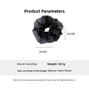 Détail du chouchou en organza noir à paillettes de 18 cm avec mesures précises