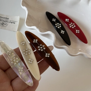 Set of vintage oval flower hair clips with crystals in five elegant colors
