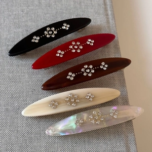 Five-piece set of vintage flower hair clips with rhinestones in five assorted colors