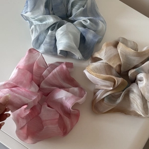 Three-piece set of gradient pearlescent silk scrunchies in blue, pink and champagne