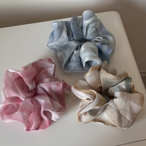 Detailed set of three large gradient organza scrunchies in pink, blue, and gold tones
