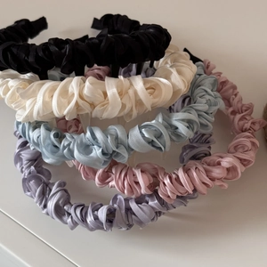 Five assorted colors of elegant pleated satin headbands with non-slip tooth design