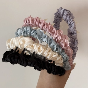 Satin fabric pleated headband with teeth in purple pink blue cream and black colors