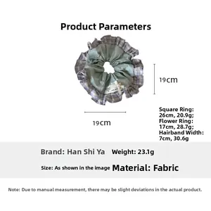 Detail showing dimensions and material of the oversized 19cm checkered scrunchie