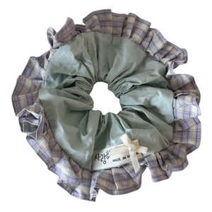 Green and purple plaid scrunchie with lace trim and elegant pearl bow accent