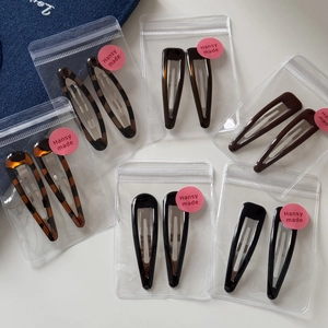 Stylish 2-piece leopard print and solid color teardrop hair clips set with branding packaging