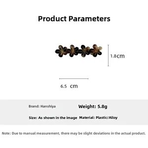 Vue détaillée de la barrette à fleurs vintage de 6,5 cm montrant dimensions et poids du matériau