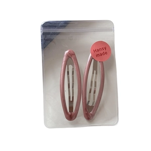Set of 2 elegant leopard print waterdrop hair clips in dusty rose marble finish
