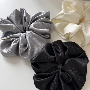 Three-piece satin scrunchie set in black, white and grey with rose jacquard floral pattern