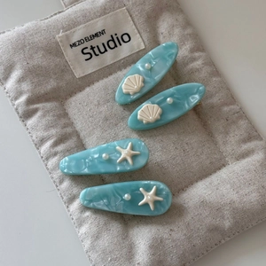 Blue ocean shell starfish acetate hair clip set with marble water ripple patterns