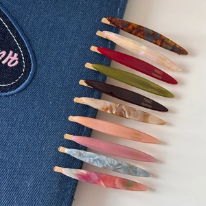 Set of 11 leaf-shaped slim hair clips with elegant marble patterns and golden clips