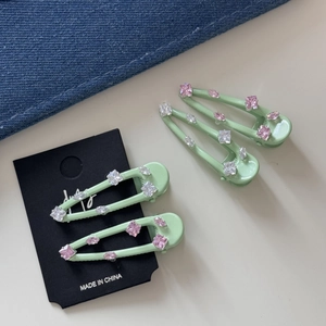 Muntgroene en roze haarspeldjesset met elegante geometrische kristallen voor dames