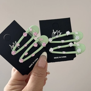 Pastelgroene en roze haarclips set voor dames met elegante sprankelende rhinestones