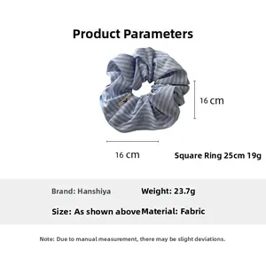 Blue striped oversized scrunchie with embroidery detail and 16cm diameter sizing