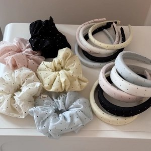 Polka dot headband and scrunchies set in various colors on white background