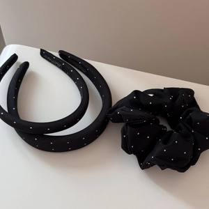 Detailed set of polka dot headbands and scrunchie in matte black and white fabric