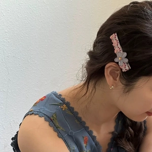 Barrette à cheveux à fleurs avec une fleur en résine violette translucide