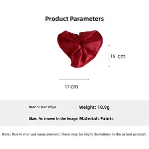 Detail view of large red satin heart scrunchie with 17cm width and 16cm height dimensions