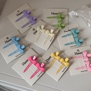 Lot de barrettes à cheveux nœud en métal coloré en violet vert rose et bleu