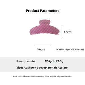 Detail view of a 10cm pink checkered acetate hair claw clip with size measurements