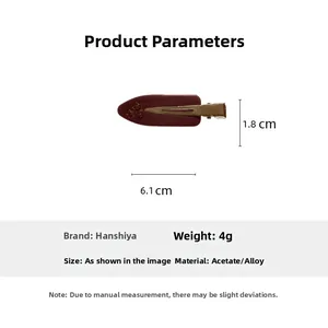 Detailed view of red marbled acetate duckbill hair clip with star rhinestones and dimensions