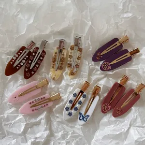 French chic acetate marble duckbill hair clips with rhinestones and pearl details