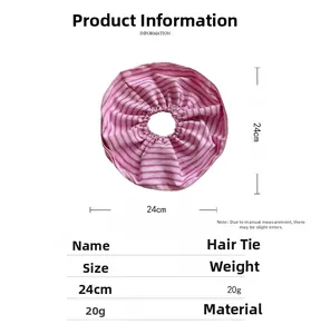 Detail showing 24cm outer diameter measurement of the pink striped fabric scrunchie