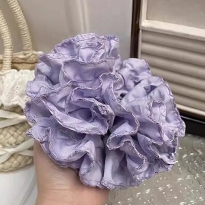 Oversized lavender purple pleated scrunchie with soft fabric layers for women