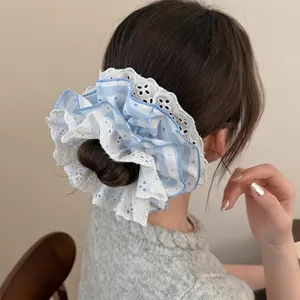 Blue and white striped lace scrunchie with layered ruffles and floral hollow edges