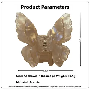 Detail view of acetate butterfly hair claw clip with size measurements 5.5cm by 6cm