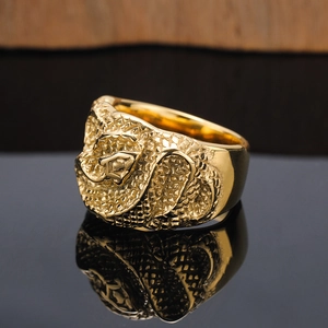 Punk vintage viper eye ring with realistic snake scale texture and gold metallic finish