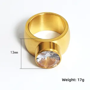 Men's bold gold-plated stainless steel ring with a large zircon and brushed finish