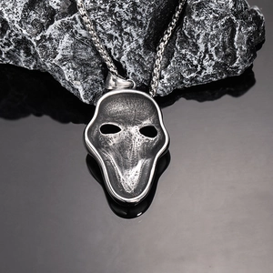 Gothic Joker mask pendant necklace in vintage titanium steel with rugged chain