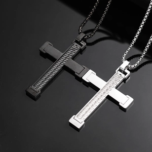 Cross necklaces in black and silver finishes featuring braided steel wire inlays on box chains