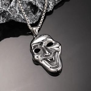 Gothic clown mask pendant in silver stainless steel with detailed fangs and box chain